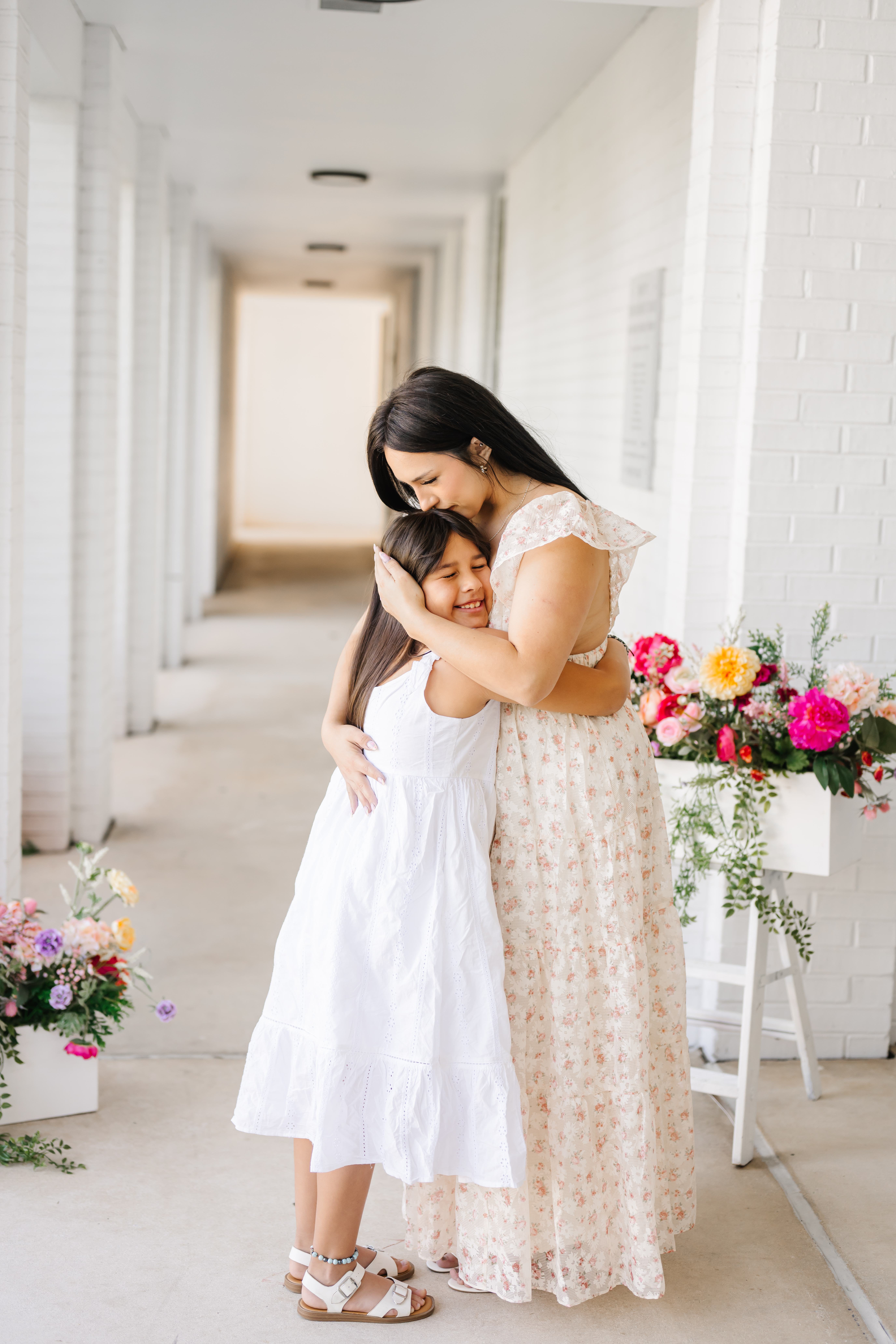 Mother and daughter hugging