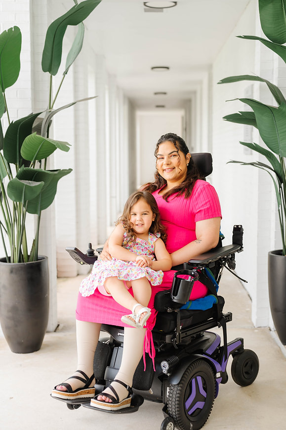 Mom in wheelchair with child on lap
